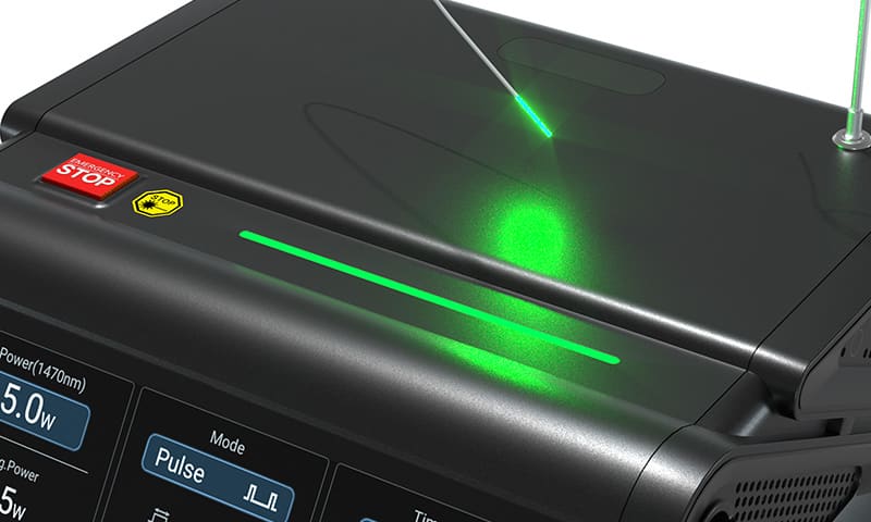 Close-up of XL EndoLaser showing green 532nm pointer laser and emergency stop safety features